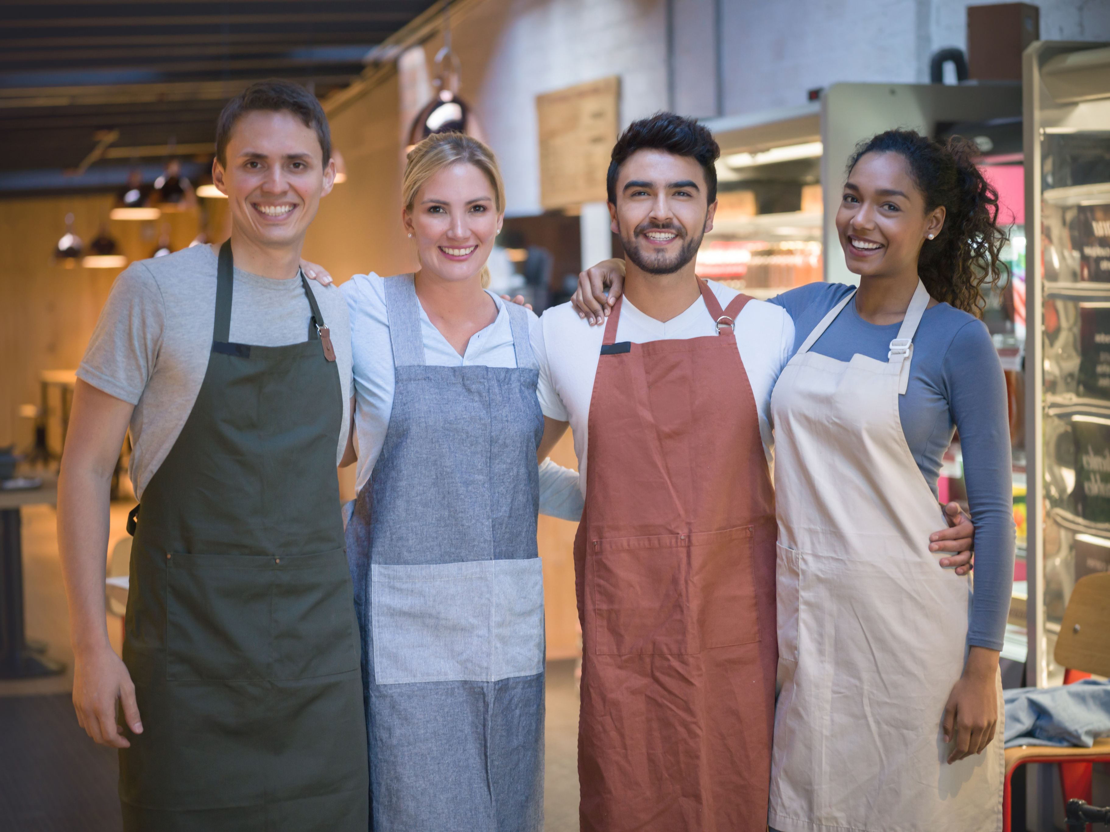Diverse team working at a food store